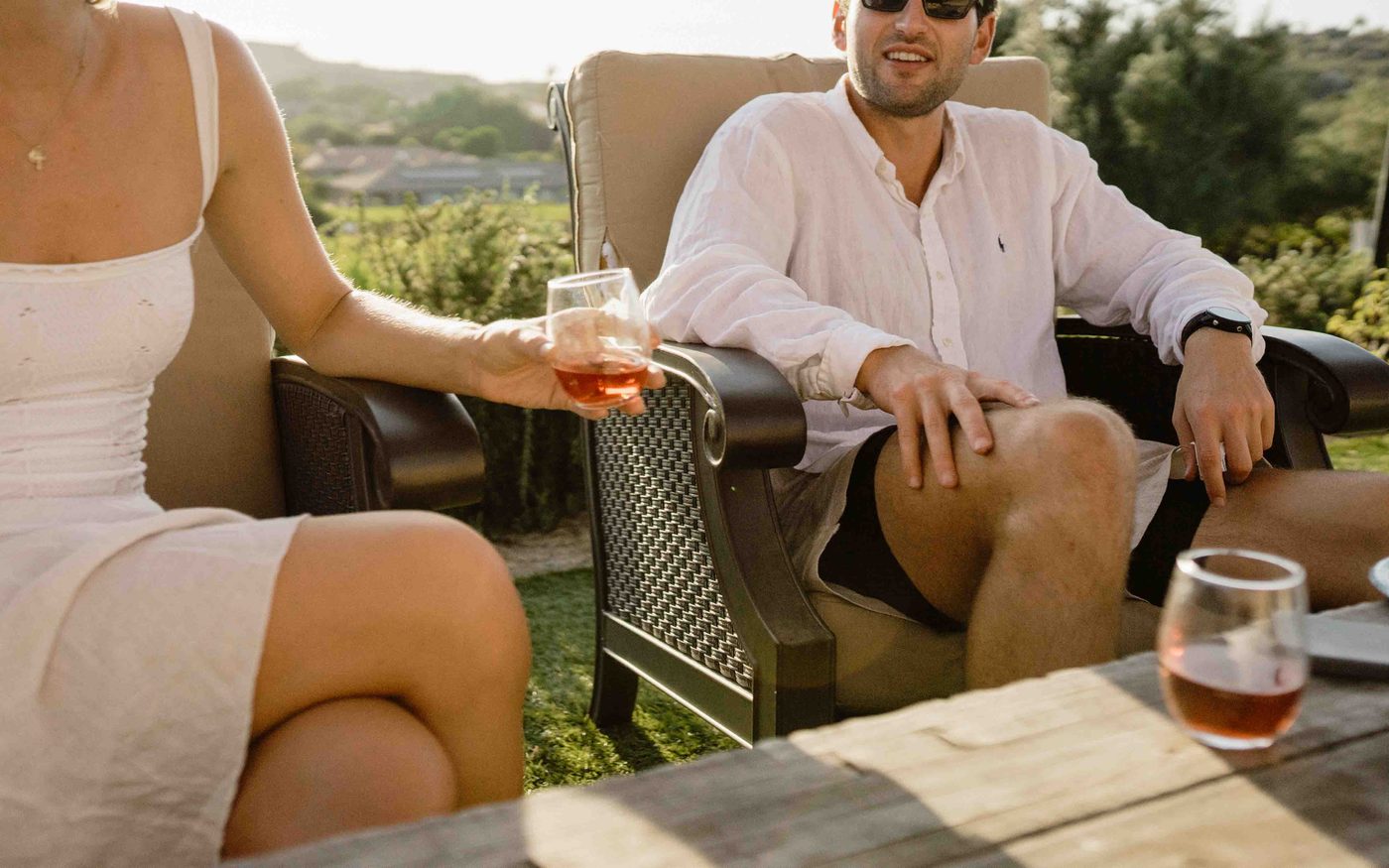 couple wine tasting vineyard