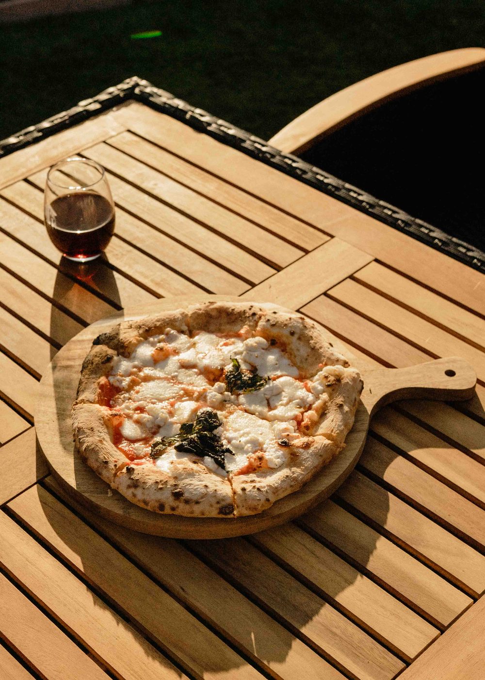 wood fired pizza on table